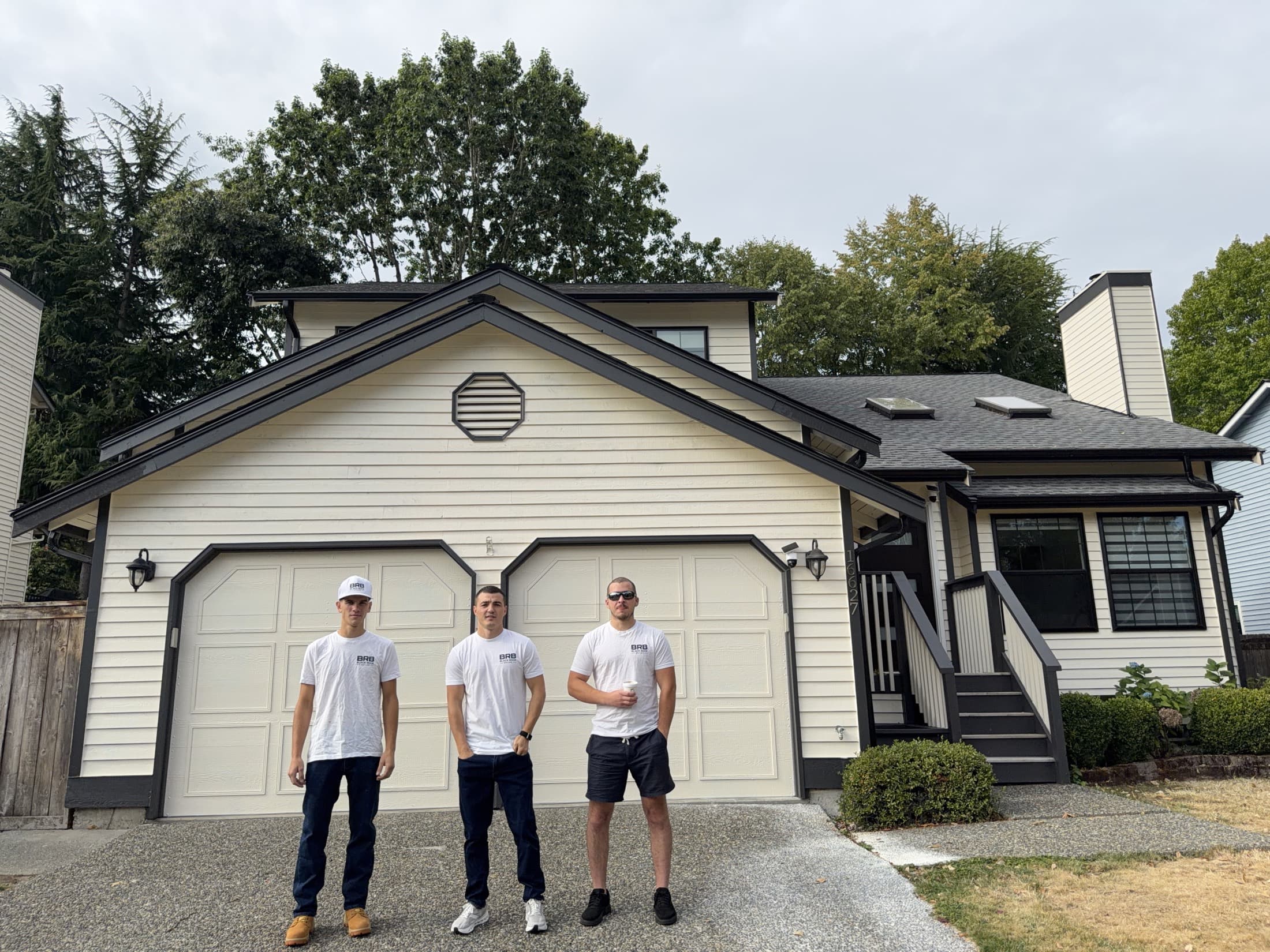 Home exterior with newly installed lap siding and black trim